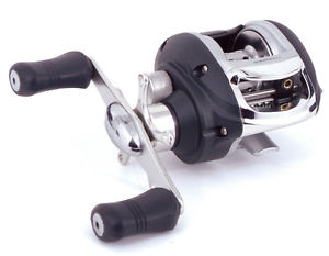 Black and silver reel body, with a double handle set up that is silver and black