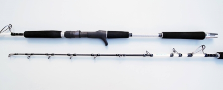 Rod displayed in two sections. The base and handle are black, and the rod is white and black with black guides